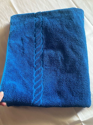 Large cotton bath towel new, blue with embossed design