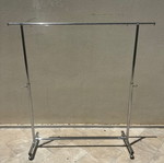 Chrome Rolling Clothes Rack foldable with adjustable height and wheels