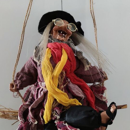 Witch figure used with sound and light-up hair