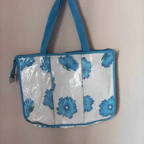 Set of seven multicolor bags including two blue backpacks and one black shoulder bag