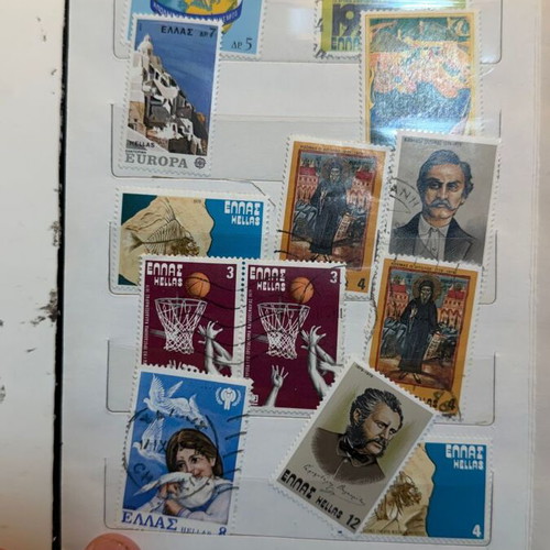 International Stamp Collection album with large vintage Greek and foreign stamps lot