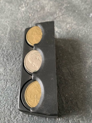 Coin holder used, as shown with coins