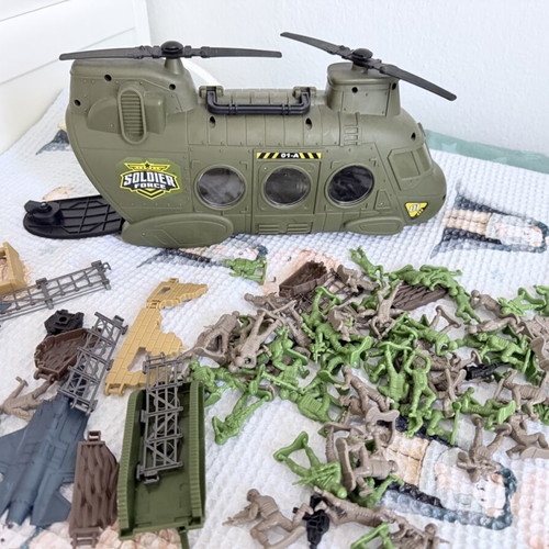 Military helicopter with soldiers like new