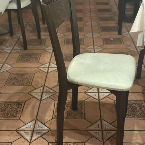 Wooden chair used with beige leather seat dark brown