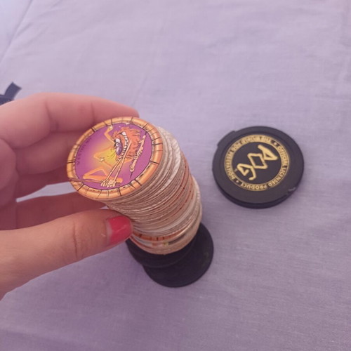 Vintage Pogs collection with Pokemon and Looney Tunes