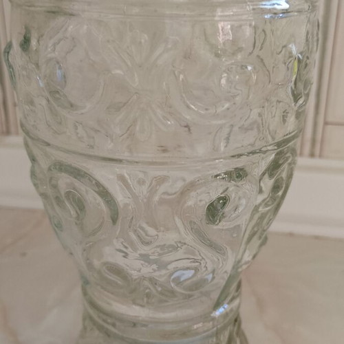 Glass decanter used with handle and beautiful pattern, unusual design