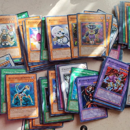 pile of yugioh cards Yu-Gi-Oh! TCG Collectible Card Game Mixed Card Lots for sale You will receive the following mint/near mint condition cards in your bundle of 50 common cards A Large Old And Rare