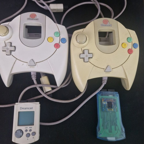 Sega Dreamcast console used with 2 games, 2 controllers, memory cards, light gun, rumble pack