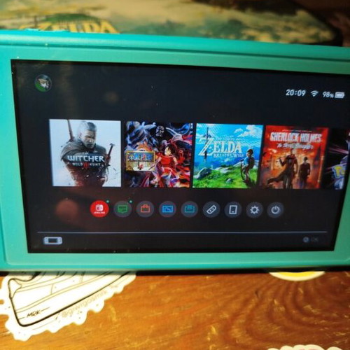 Nintendo Switch Lite Turquoise 32GB bundle with case and SD card used