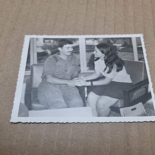 Black and white photo of soldier and friend used