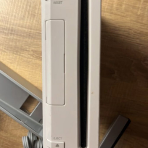 Nintendo Wii console with cables and one controller