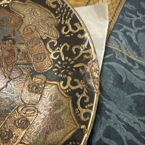 Decorative handmade plate used with embossed design and damage
