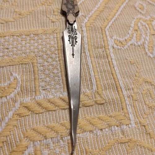 Vintage metal sewing stiletto with Art Nouveau motifs