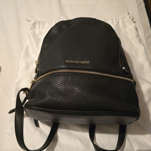 Michael Kors black backpack like new with gold details
