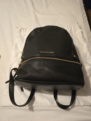 Michael Kors black backpack like new with gold details