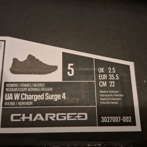 Under Armour UA W Charged Surge 4 running shoes new, black size 35.5