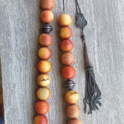 Silver Komboloi with 23 authentic apple coral beads, like new