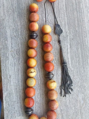 Silver Komboloi with 23 authentic apple coral beads, like new