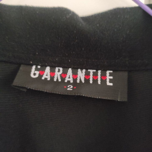 Garantie women's black shirt size M/L like new