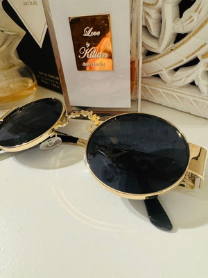 Sunglasses with gold embossed frame new, black and gold
