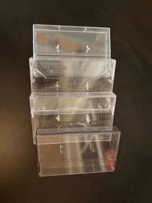Set of 4 transparent plastic audio cassette cases
