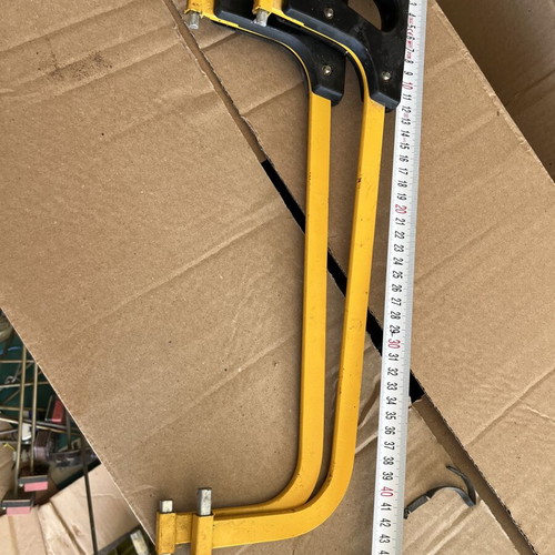 Hacksaws like new with yellow metal frame and black plastic handle
