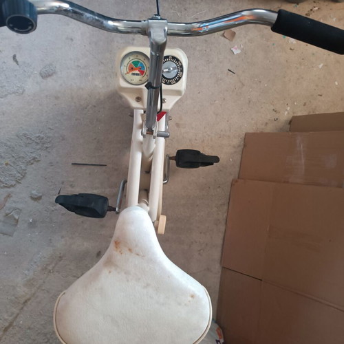 Stationary Exercise Bike used, 1990s model with adjustable resistance