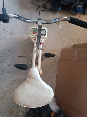 Stationary Exercise Bike used, 1990s model with adjustable resistance