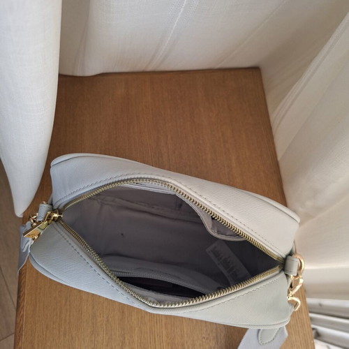 Carpisa bag like new, soft blue with gold details