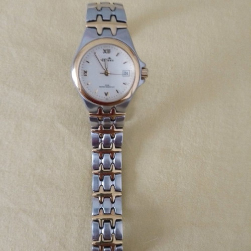Ellesse vintage wristwatch used, gold women's