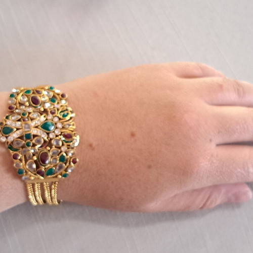 Vintage gold bracelet with colorful stones