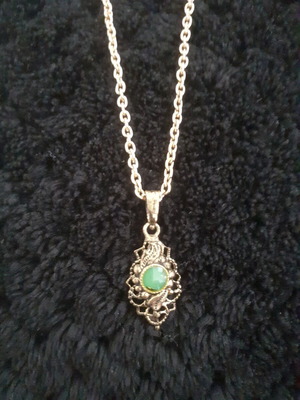 Vintage gold pendant with green stone from the 70s, like new
