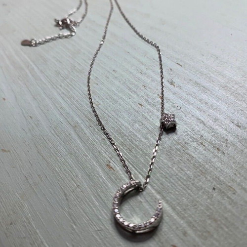 Silver pendant necklace with zircon stones, moon and star design, new