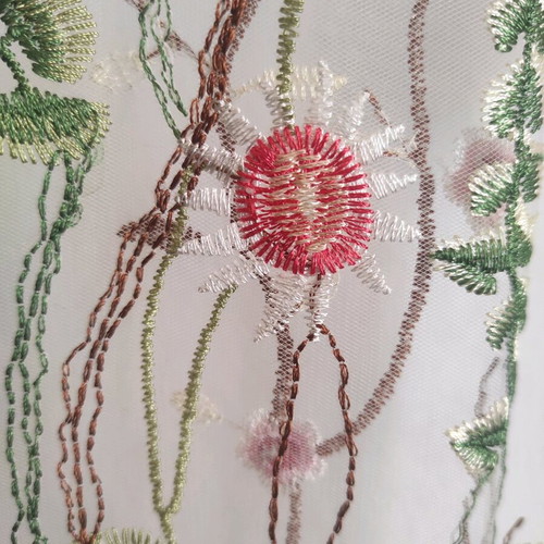 Transparent embroidered mesh blouse with floral designs, like new