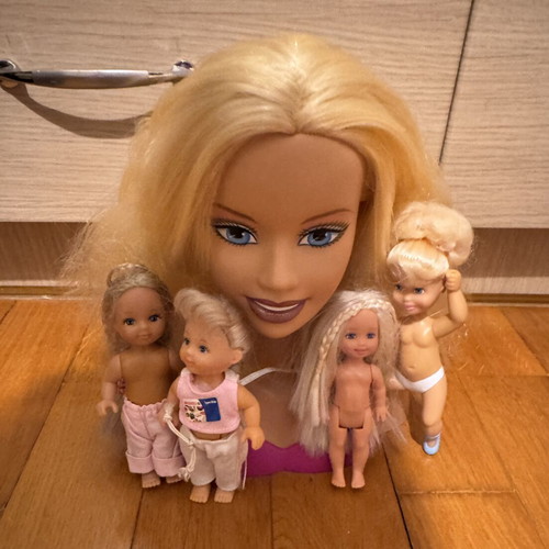 Barbie hairstyling head with small Shelly or Kelly dolls