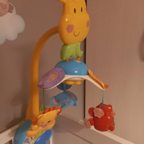 Fisher Price musical rotating mobile used with wind-up mechanism