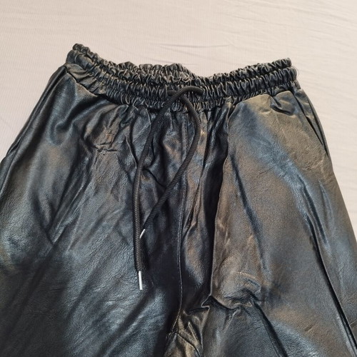 Leather pants like new, elastic waist and cuffs, black