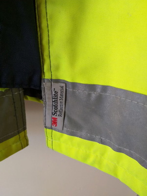 Waterproof work jacket used with reflective strips