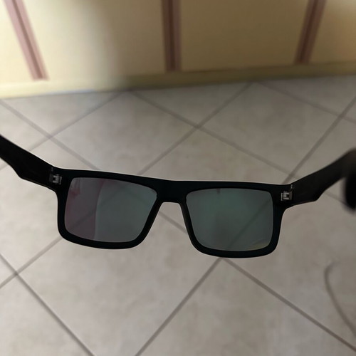 Polarized sunglasses new with green lens and black frame