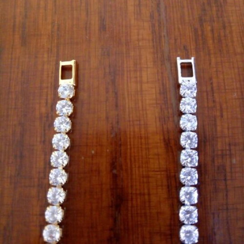 Riviera bracelet new, gold and silver with zircon stones, 18cm