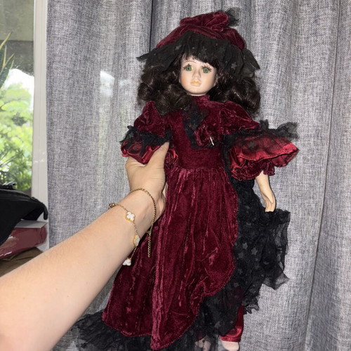 Vintage porcelain doll with velvet details, new