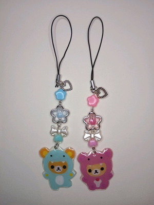 Matching Dino Rilakkuma keychains like new, blue and pink