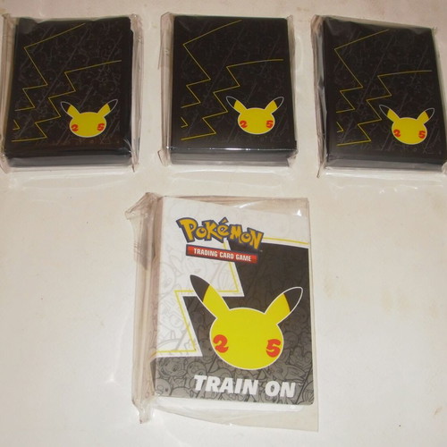 Pokemon Celebrations pack like new with box sleeves portfolio and stickers