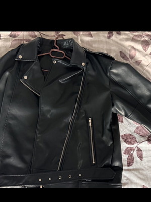Black biker jacket size L made of eco leather like new