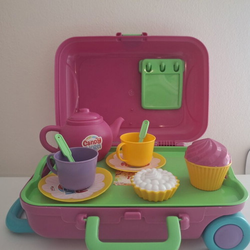 Toy Kitchen Set like new with tea set luggage and utensils