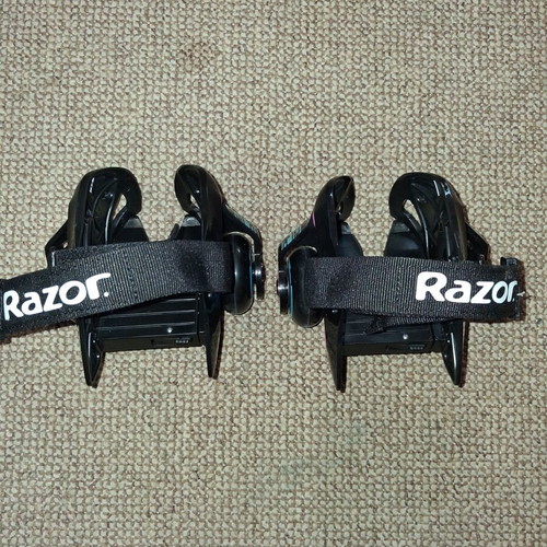 Razor Jetts Heel Wheels used, adjustable size, black with blue and pink details
