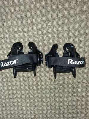 Razor Jetts Heel Wheels used, adjustable size, black with blue and pink details