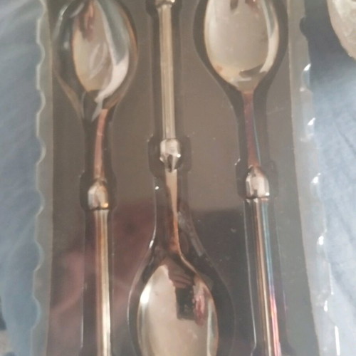 Silver decorative bowls, cup and six spoons used