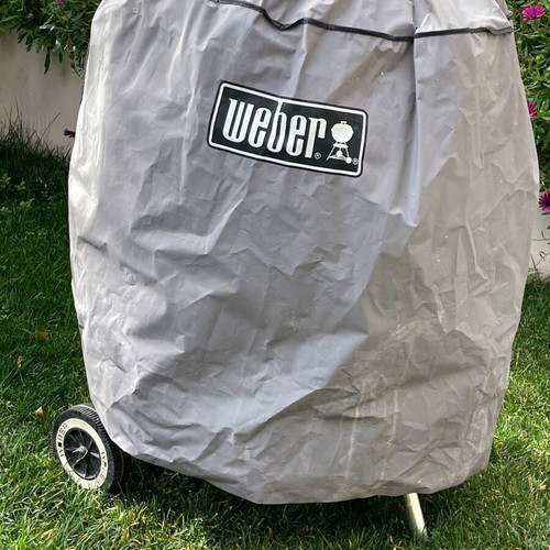 Weber grill used with storage cover