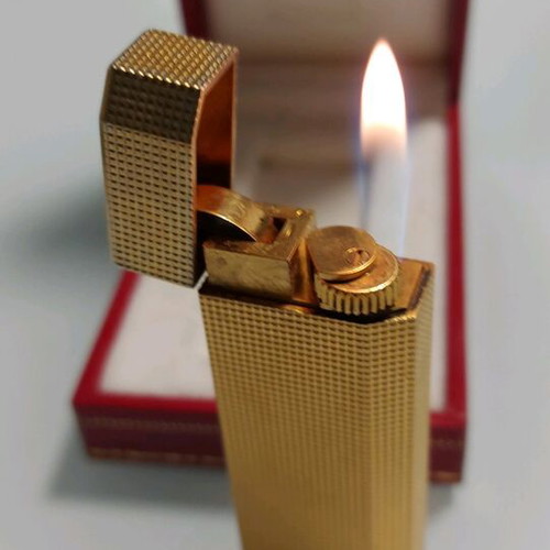 Cartier mod pentagon lighter used with heart box